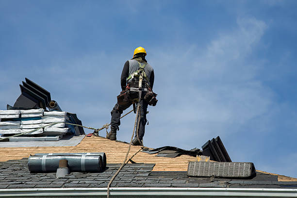 Professional Roof Replacement technician working in Greensboro, IN